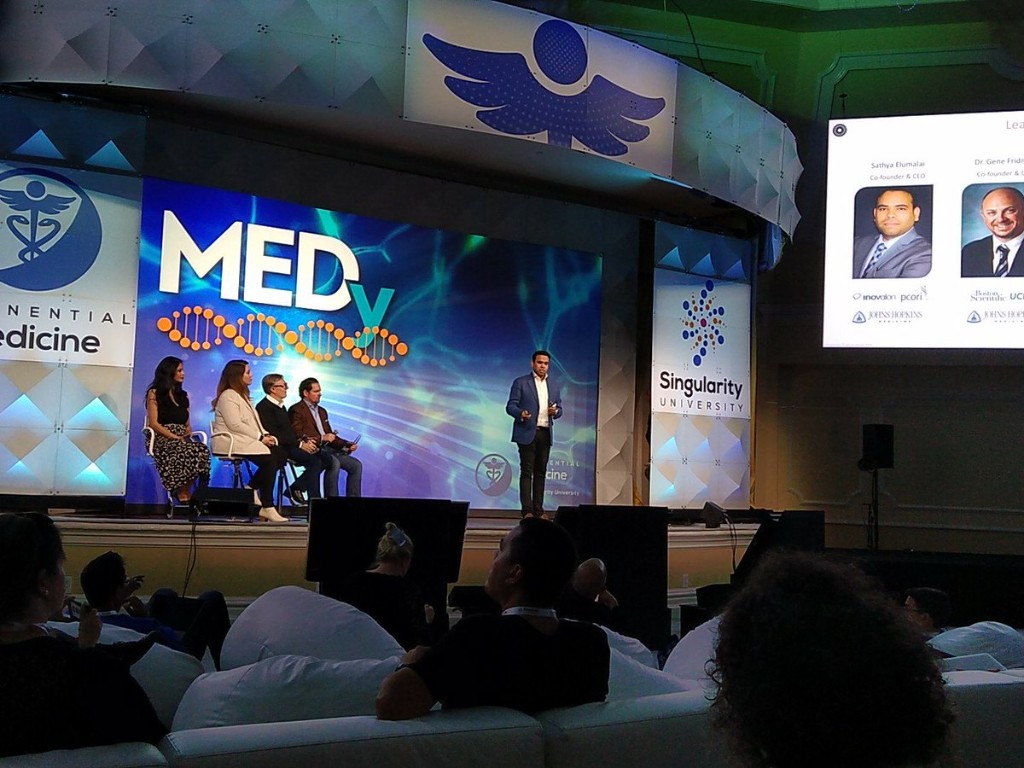 Sathya speaking on the MEDx stage