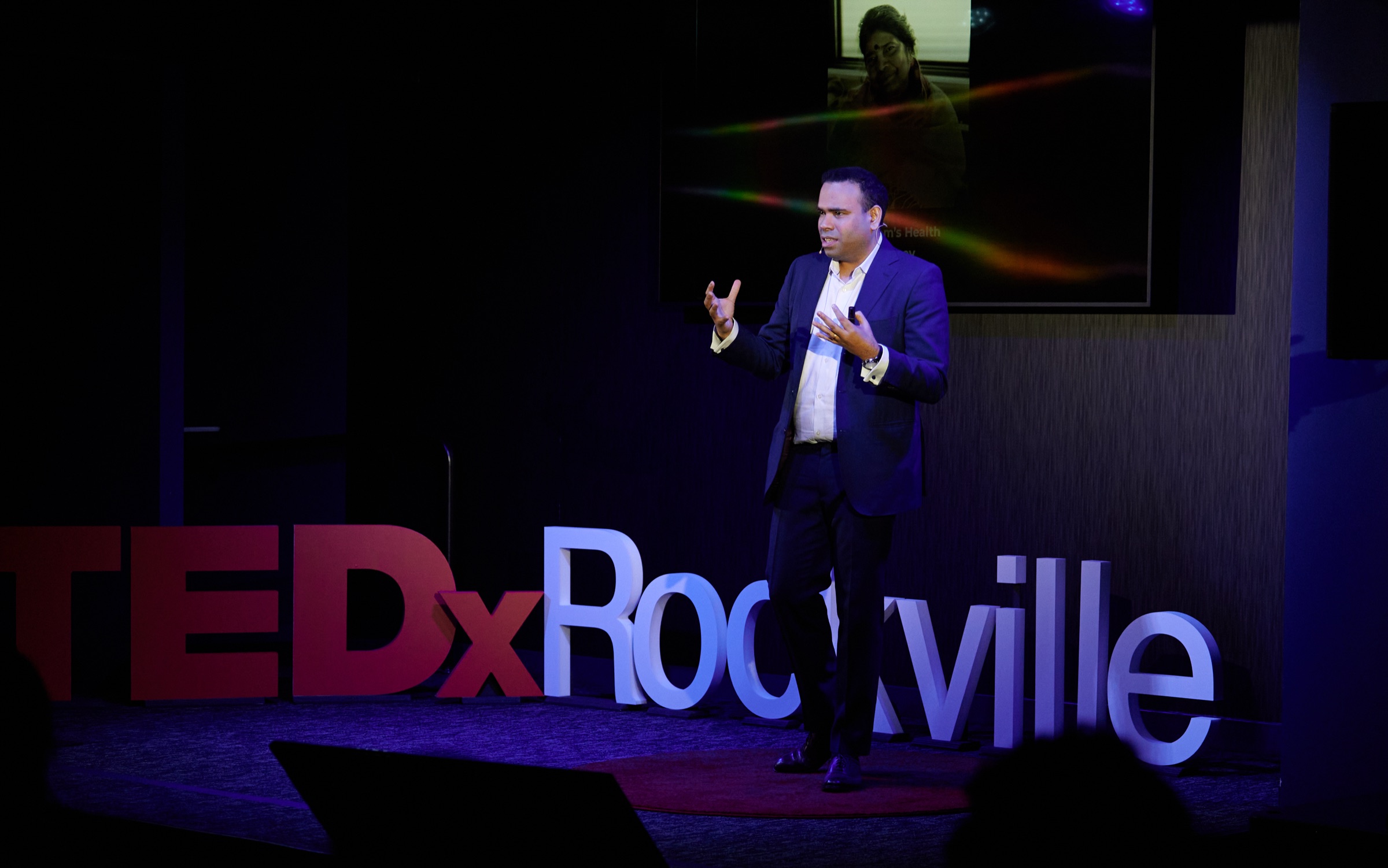 Sathya Elumalai delivering a TEDxRockville talk on early detection
